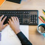 person-typing-on-black-computer-keyboard