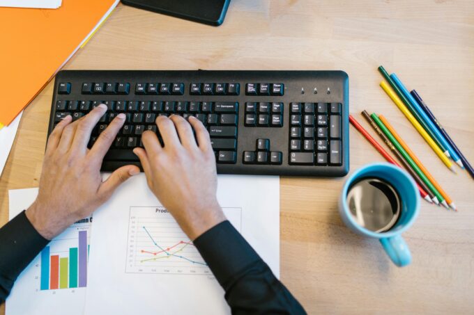 person-typing-on-black-computer-keyboard