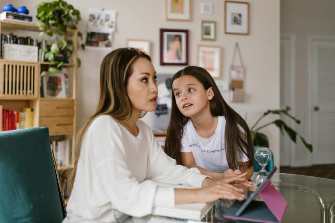 Woman distracted from work by her daughter