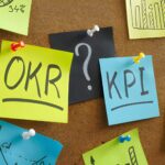 memo-sticks-with-okr-vs-kpi-words-on-the-board