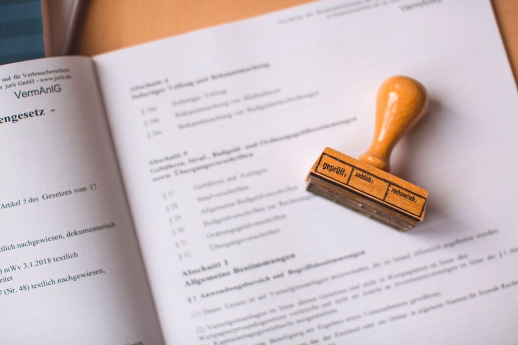 10 Types of Management Styles 3 wooden-stamp-on-an-open-book