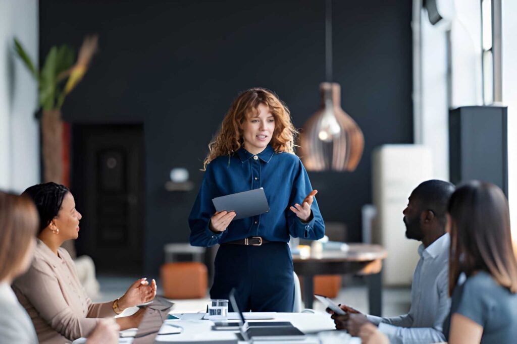 10 Types of Management Styles 2 business-professional-leading-team-presentation-in-modern-office-setting