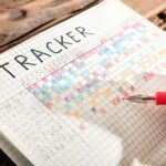 Person marking their tracker book
