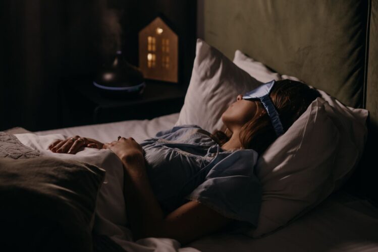 asleep-woman-wearing-eye-mask